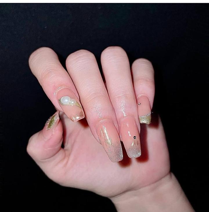 Gold and pearl nail art